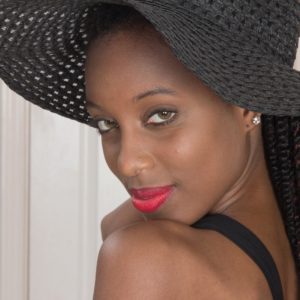 Bony ebony amateur Saf spreads her natural vag while clad a sun hat and high heeled shoes