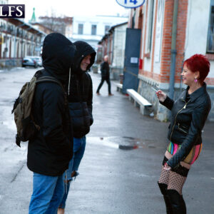 Redheaded 60 plus MILF Caroline Hamsel seduces men on a street in slutty clothing
