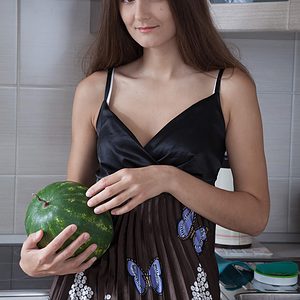 First-timer Shivali licks a watermelon while showing her furry underarms and pussy