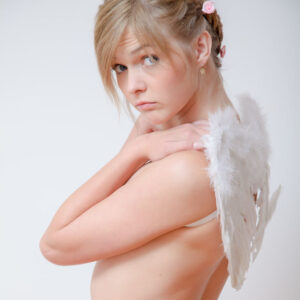 Angelic blonde teen Fulvia poses nude in angel wings